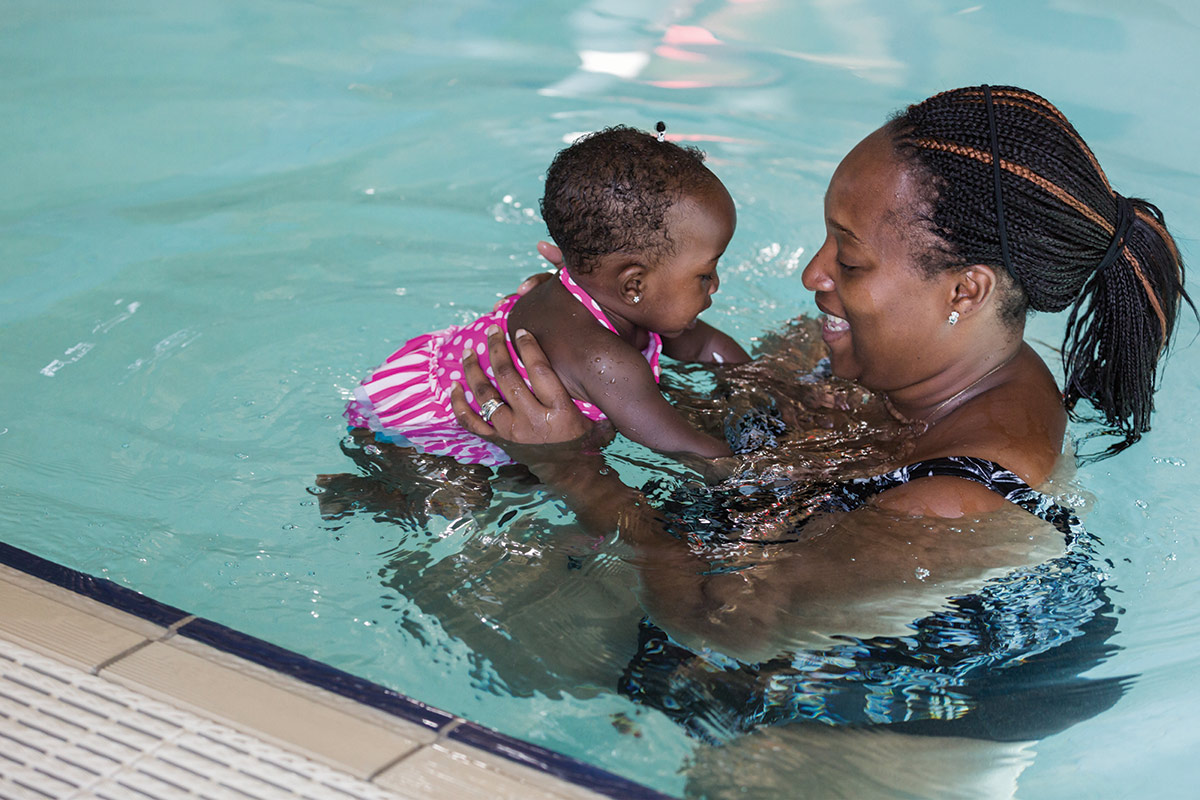 mom and daughter swimming to determine what age should my child start swim lessons?